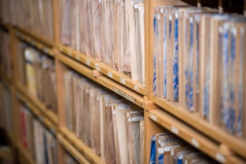 Selective focus on files on shelf